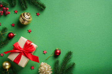 Christmas flat lay background on green.