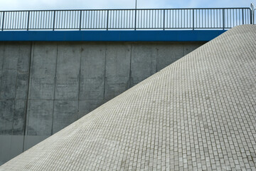 Fototapeta premium view of the construction of the dam and the bridge for transport and pedestrians
