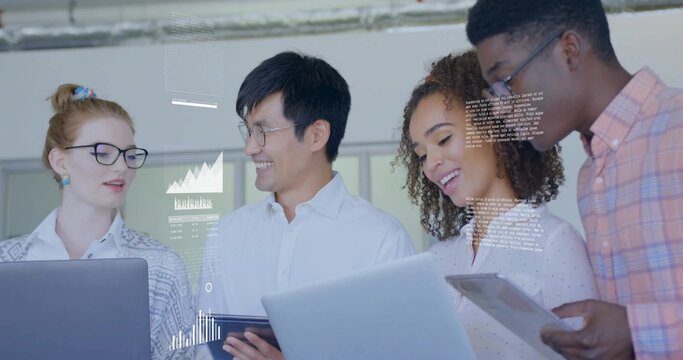 Four professionals reviewing digital data projections in bright office with laptops and tablets - Powered by Adobe
