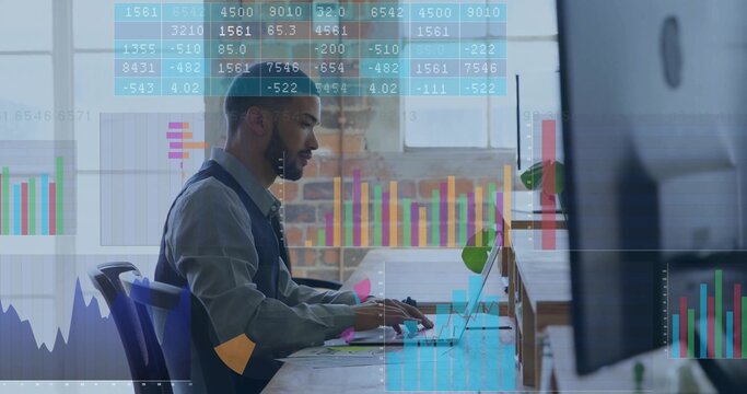 Data analyst typing on keyboard and analyzing charts on monitor in modern office, with sticky notes