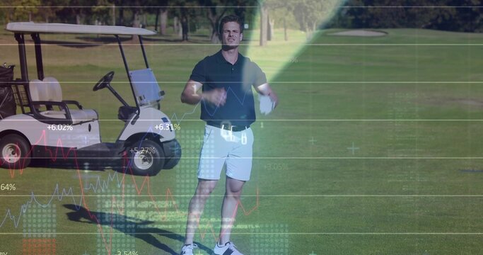 Gesturing golfer wearing golf attire holding balls on golf fairway with golf cart and data charts