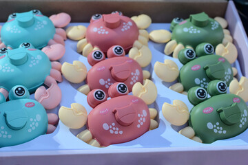 new colorful plastic toy crabs for sale on store counter © Olena