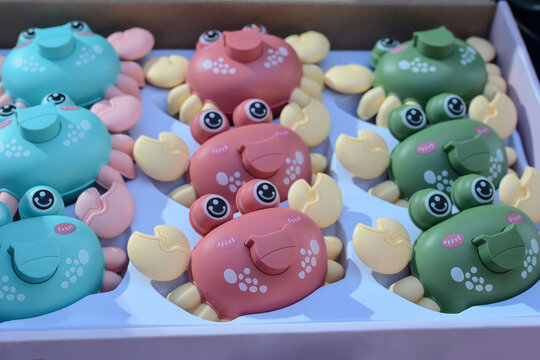 new colorful plastic toy crabs for sale on store counter