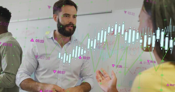 Presenting mid adult male in shirt explaining financial graphs at office with chart overlays
