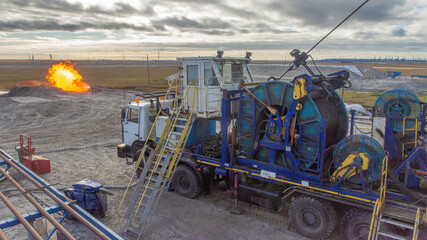 The Northern gas field. Summer. Installation for lowering a flexible pipe into a well. Equipment...