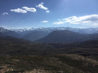 mountain landscape with clouds, sun rays at spiti valley