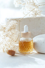 Modern natural skincare product with oil bubbles, honeycomb texture, and macadamia details on neutral background. Clean, minimal composition with realistic lighting.