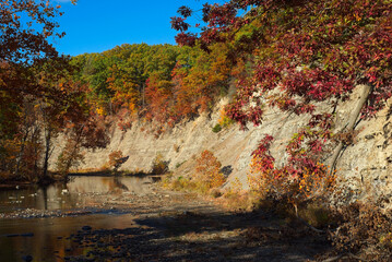 High cliffs rise abruptly over the Rocky River in Rocky River Reservation, a metro park in Greater Cleveland, Ohio.