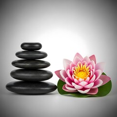 Stacked black stones beside pink lotus flower wellness