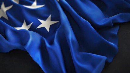 A close-up shot of a blue flag with white stars, ideal for patriotic or nationalistic concepts