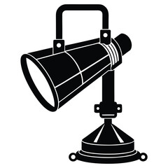 Black silhouette of a studio spotlight on a stand Keywords: spotlight, studio light, stage lighting, theater