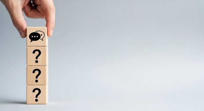 Wooden cube block with question mark and speech bubble icon - Powered by Adobe