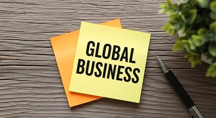 Global business concept with sticky note on wooden table