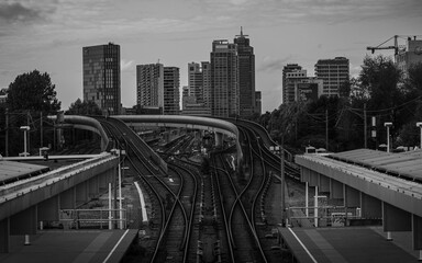 Fototapeta premium Panorama of Amsterdam with skyscrapers and metro tracks
