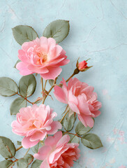Pink roses on a vintage textured blue background. Delicate floral flat lay with soft flowers and leaves. Romantic spring concept with copy space