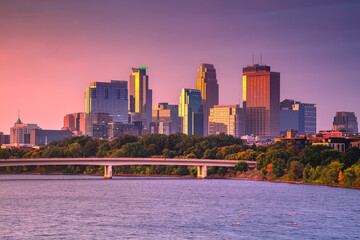 Minneapolis, Minnesota, USA. Panoramic cityscape image of downtown Minneapolis, Minnesota, USA at beautiful autumn sunrise.
