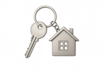 Key and house shaped keychain representing real estate, new home purchase, property investment, or ownership concept