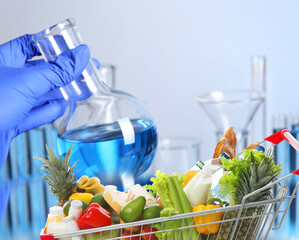 Food analysis. Laboratory worker examining quality of fresh products