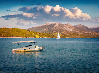 Sunny morning from Madouri Beach. Stunning summer seascape of Ionian Sea. Wonderful outdoor scene of Lefkada island, Greece, Europe. Traveling concept background.