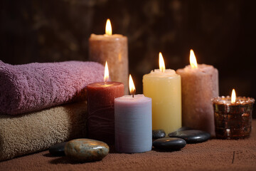 Romantic spa still life with burning candles and flame light for relaxation and aromatherapy