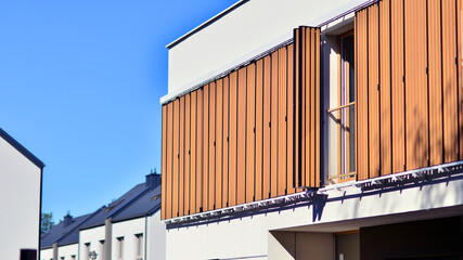 Newly built terraced houses in a residential area. Modern terraced houses on the outskirts of the city.