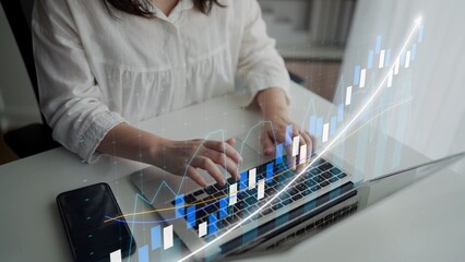 A professional office worker engages with a laptop, analyzing financial data. A digital stock chart overlay illustrates market trends and economic growth. Copula