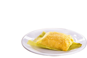 pamonha, brazilian corn sweet, packaged with straw, served in these juninas, on isolated white background