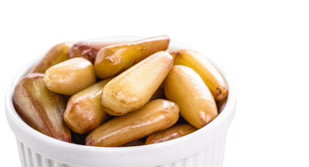pinhão seeds, the seed of the araucaria, a tree found in the South and Southeast of Brazil, consumed cooked or roasted, mainly in autumn and winter, isolated white background