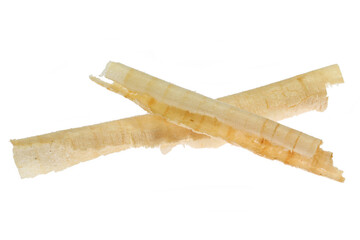 Swiss pine wood shavings isolated on white background