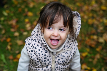 Fototapeta premium Toddler girl in autumn park