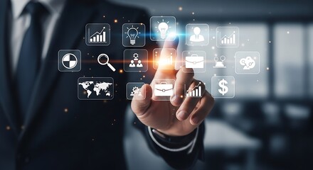 Businessman interacting with digital interface featuring icons of business and technology concepts