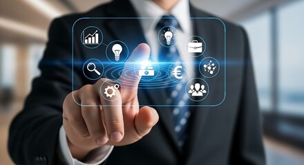A businessman touching a digital interface with business and technology related icons displayed
