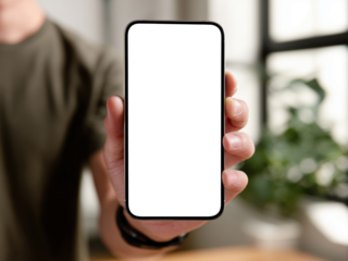 Professional hand displaying blank smartphone in modern office environment