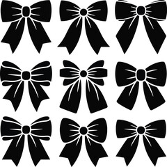 Collection of nine black ribbon bows on a white background