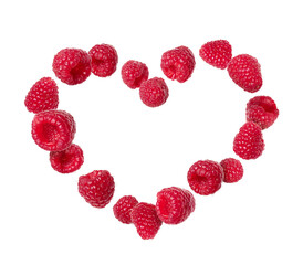 Fresh raspberries arranged in heart form on transparent background