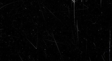 Abstract dark background with scratches and dust particles; dramatic texture. For artistic designs.