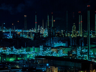 Factory-oil and gas industry, Oil refinery industrial plant at night, oil and gas chemical tank with oil refinery plant background at twilight, business power and energy chemical barrel