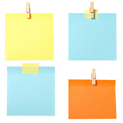 Four colorful square sticky notes, each held by a wooden clip or adhesive