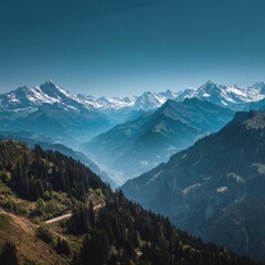 Mountain landscape of snow-capped mountains in the mist.

