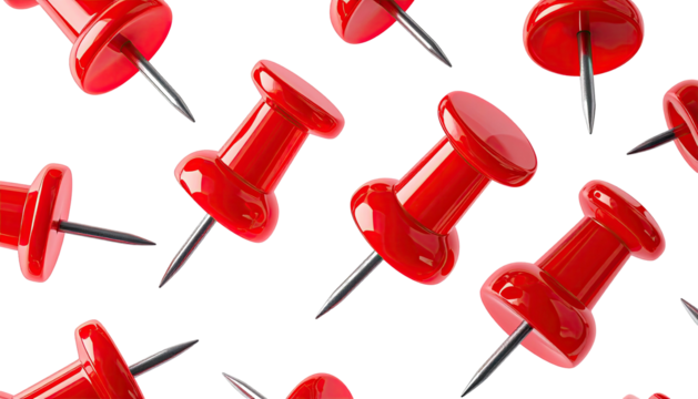 Red pushpins with metallic pins, scattered against a solid black background