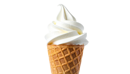 Swirled creamy soft-serve ice cream cone against a plain background, close-up view