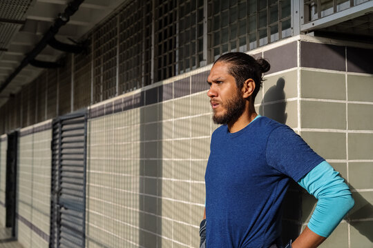 Determined football player ready to come out to the pitch