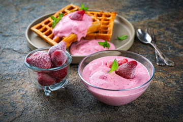 Fresh baked homemade Belgian Brussels waffles with yogurt fresh cream cheese topping dessert and...