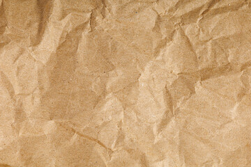 Brown texture kraft paper, recycled cardstock. Old crumpled recycled paper of old crumpled recycled paper