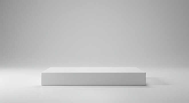 Minimalist white rectangular podium or display stand on a seamless light gray background