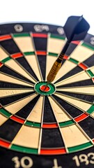 Obraz premium Close-up of a dart hitting the bullseye of a dartboard