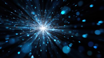 Abstract blue light explosion with bokeh effect against a dark background