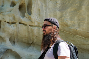 Man Exploring Uplistsikhe Cave City in Georgia
