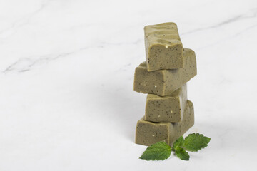Green tea matcha candy. White background. Copy space
