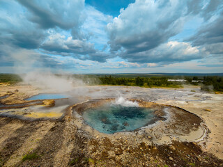 The geothermal area with geysers in Iceland